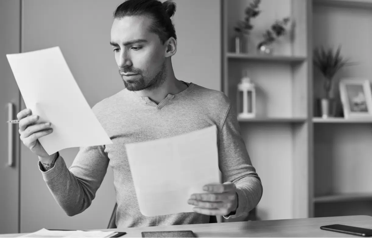 man reviewing documents